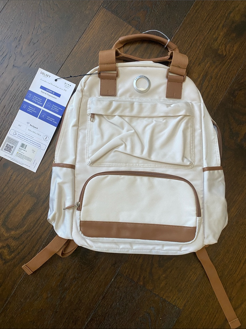 Delsey Cream Travel Backpack with Tan Accents